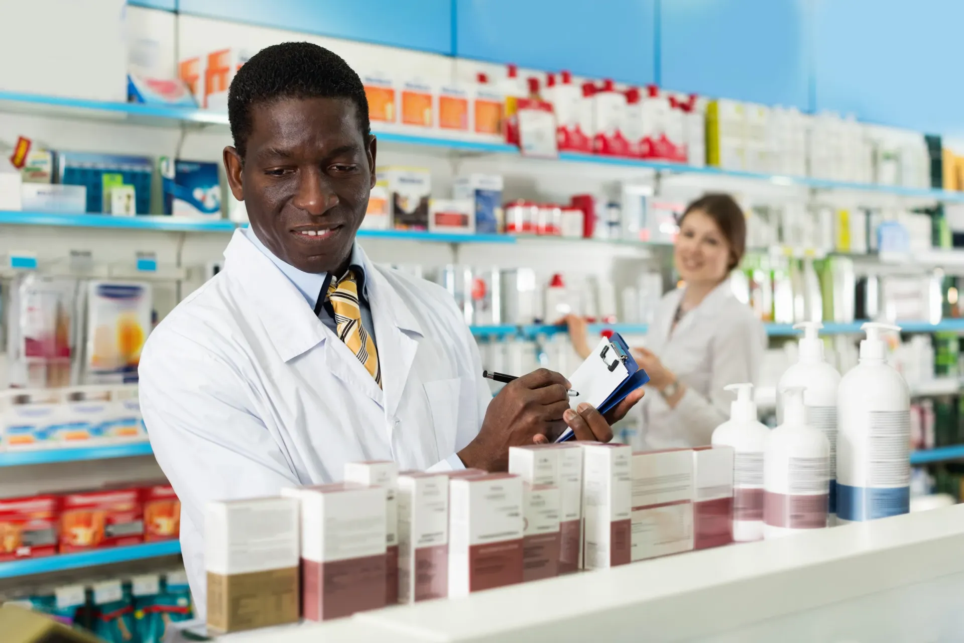 Ashworths Clinic pharmacy team preparing patient care in the pharmacy.