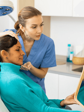 A patient is having her skin consultation at Ashworths Clinic in Ashford, Kent.